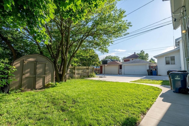 3011 16th St, Racine, WI 53405 - view of yard with a garage and a storage unit