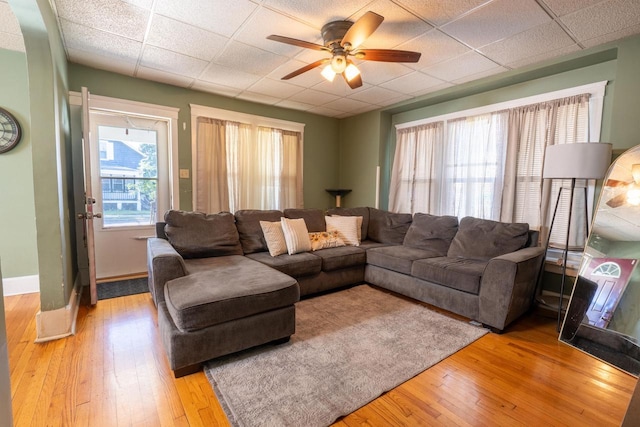 3011 16th St, Racine, WI 53405 - living room with a drop ceiling, a ceiling fan, and light wood finished floors