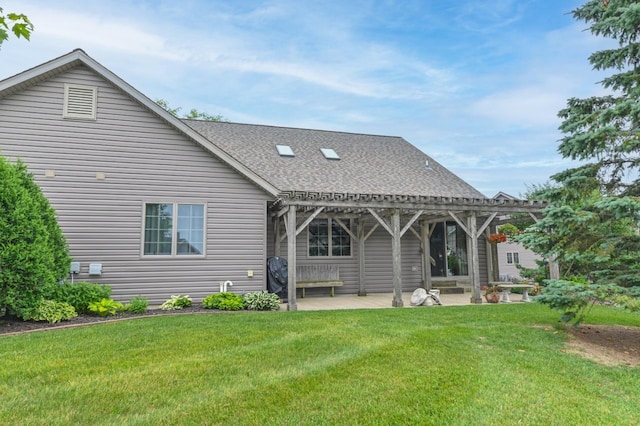 W203N16149 Pin Oak Cir, Jackson, WI 53037 - back of property featuring a pergola, roof with shingles, a patio area, and a lawn