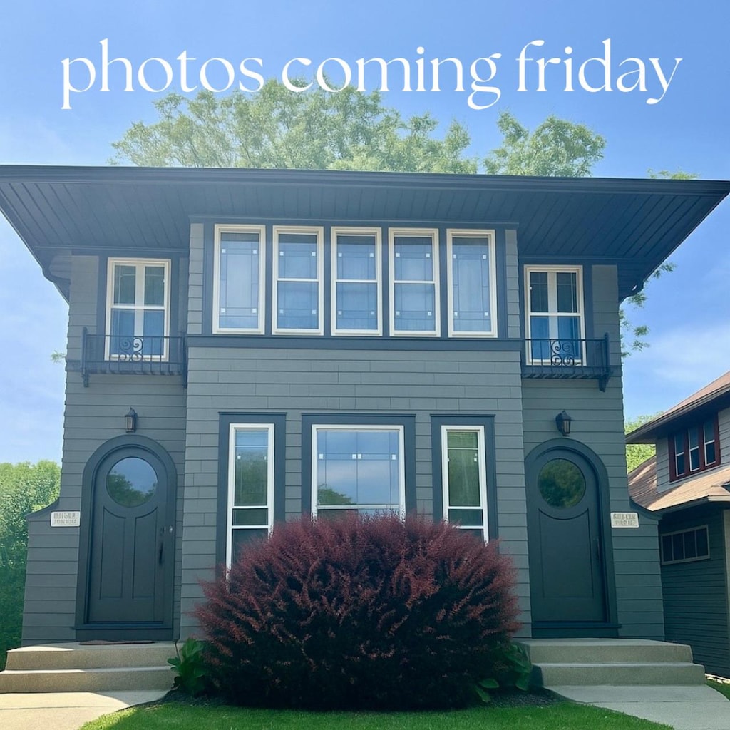 2539 N 68th St Unit 2541, Wauwatosa, WI 53213 - view of front facade with a balcony and entry steps