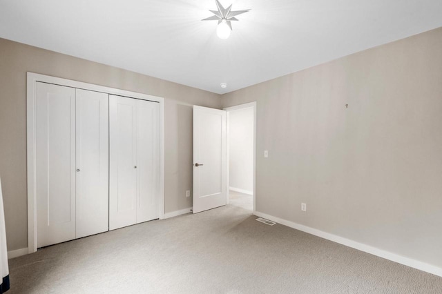 217 N Van Buren St, Green Bay, WI 54301 - unfurnished bedroom with a closet and carpet floors