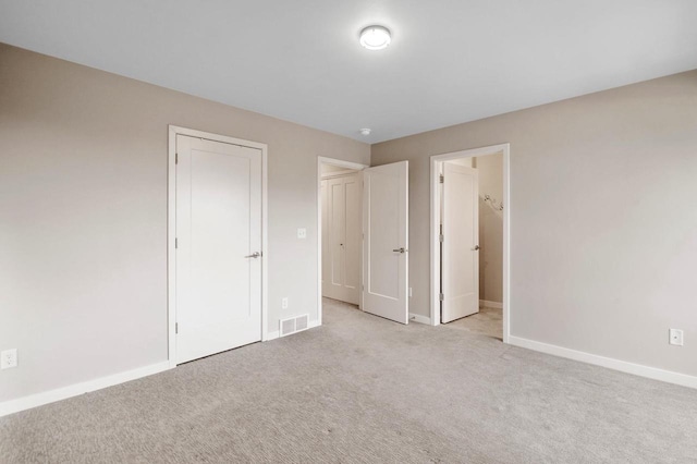 217 N Van Buren St, Green Bay, WI 54301 - unfurnished bedroom with carpet flooring and baseboards