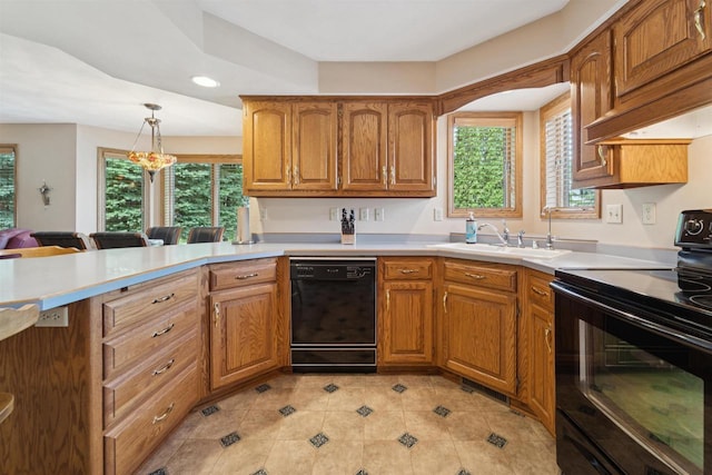330 W Florida Ave, Appleton, WI 54911 - kitchen with black appliances, light tile patterned flooring, recessed lighting, and brown cabinets