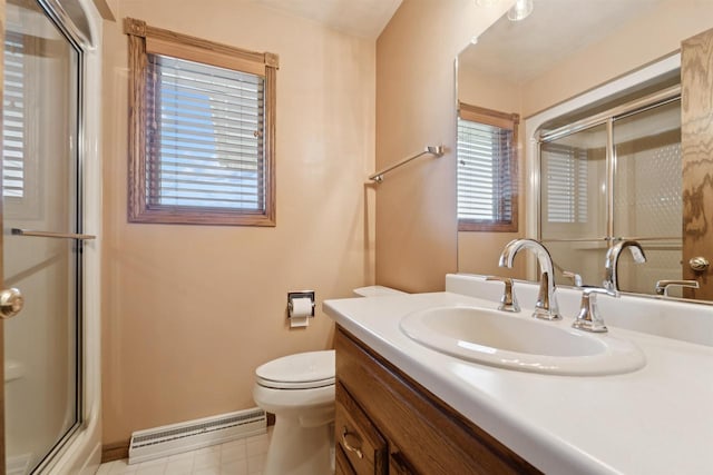 330 W Florida Ave, Appleton, WI 54911 - bathroom featuring baseboard heating, a shower stall, and vanity