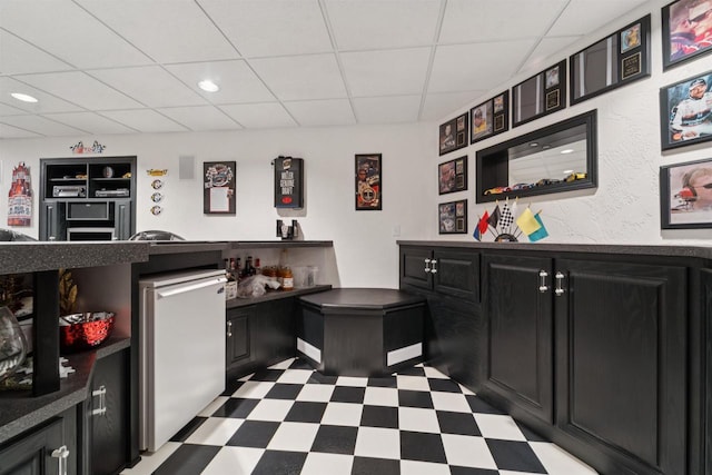 330 W Florida Ave, Appleton, WI 54911 - bar area with dark floors, a drop ceiling, recessed lighting, and dishwasher