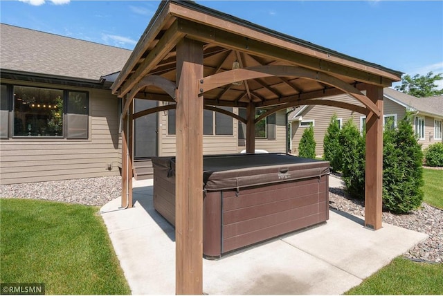 3735 Crest Ridge Ct, Eau Claire, WI 54701 - view of patio with a hot tub, grilling area, and a gazebo