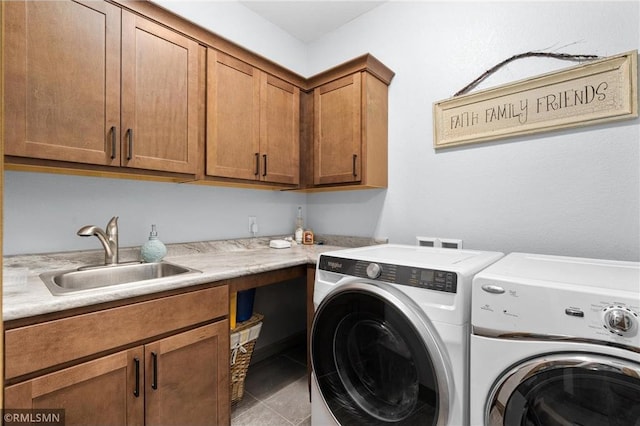 3735 Crest Ridge Ct, Eau Claire, WI 54701 - laundry area with washer and clothes dryer, cabinet space, and light tile patterned flooring