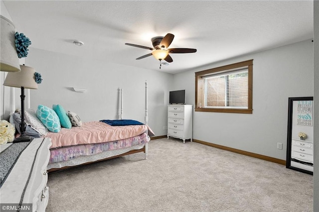 3735 Crest Ridge Ct, Eau Claire, WI 54701 - carpeted bedroom featuring baseboards and a ceiling fan