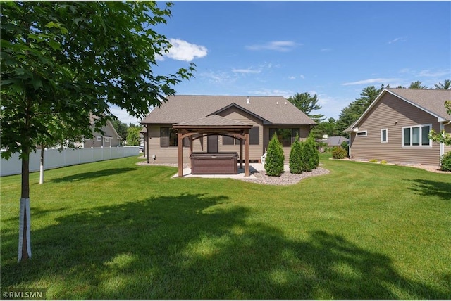 3735 Crest Ridge Ct, Eau Claire, WI 54701 - view of front of home with a hot tub, a gazebo, a shingled roof, and a patio