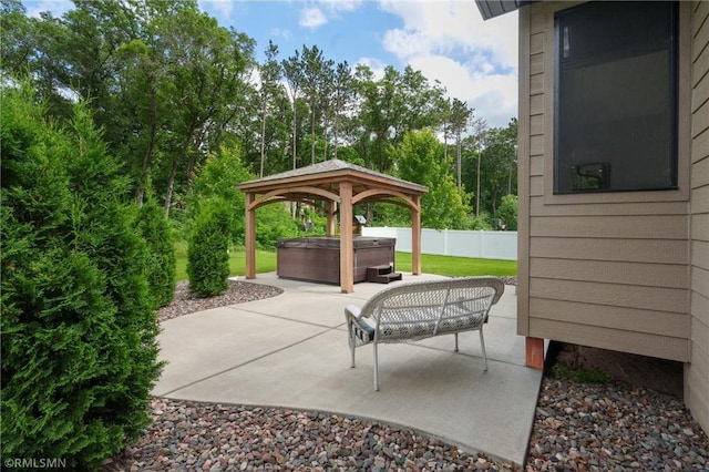 3735 Crest Ridge Ct, Eau Claire, WI 54701 - view of patio / terrace with a hot tub and a gazebo