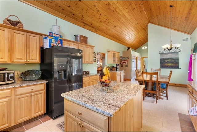 2282 71st St, Luck, WI 54853 - kitchen featuring black fridge with ice dispenser, stainless steel microwave, vaulted ceiling, wooden ceiling, and light brown cabinetry