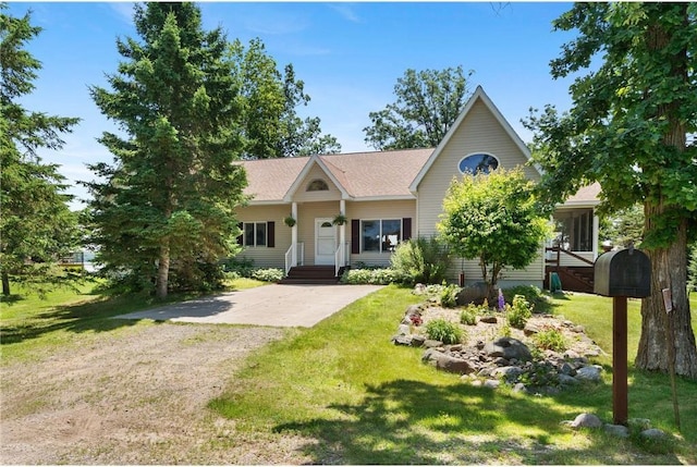 2282 71st St, Luck, WI 54853 - single story home featuring a front yard and dirt driveway