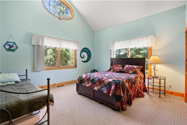 2282 71st St, Luck, WI 54853 - carpeted bedroom with high vaulted ceiling and multiple windows
