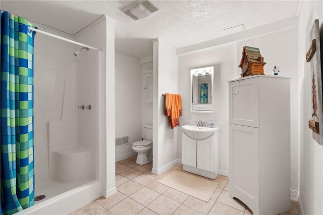 2282 71st St, Luck, WI 54853 - bathroom featuring tile patterned flooring, a shower stall, vanity, and a textured ceiling