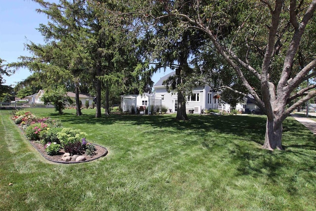 1515 Rugby St, Oshkosh, WI 54902 - view of yard with an outbuilding