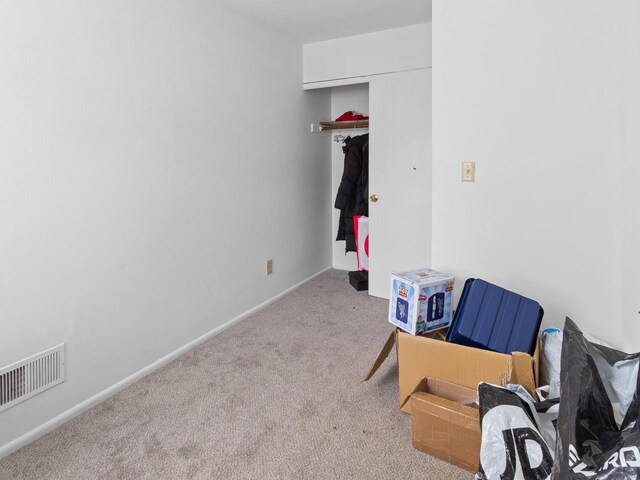 8871 N Swan Rd Unit K, Milwaukee, WI 53224 - carpeted bedroom featuring baseboards