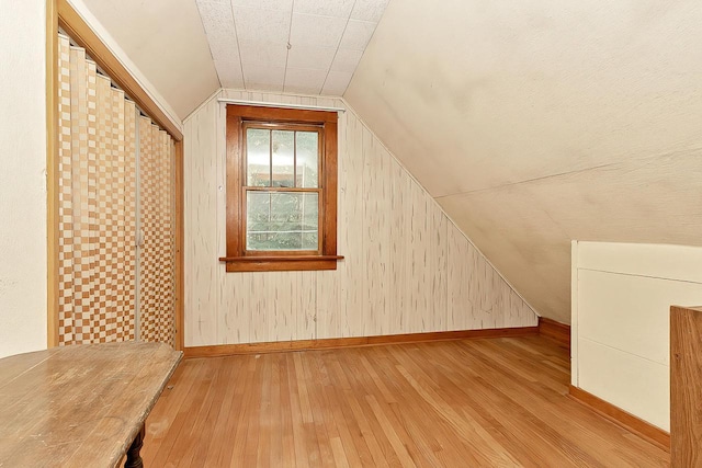 N1236 Walnut Rd, Genoa City, WI 53128 - bonus room with wood-type flooring and lofted ceiling