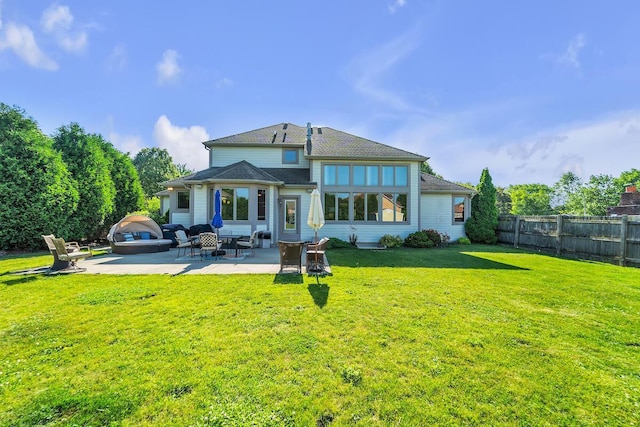8668 47th Ave, Kenosha, WI 53142 - back of property with a patio area and a fenced backyard