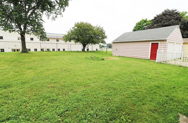 322 E N Ave, Little Chute, WI 54140 - view of yard with an outbuilding and a garage