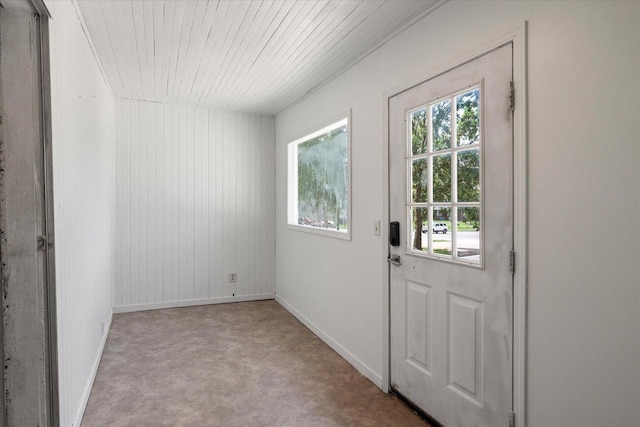 624 S Main St, Westby, WI 54667 - doorway to outside with carpet flooring and wood ceiling