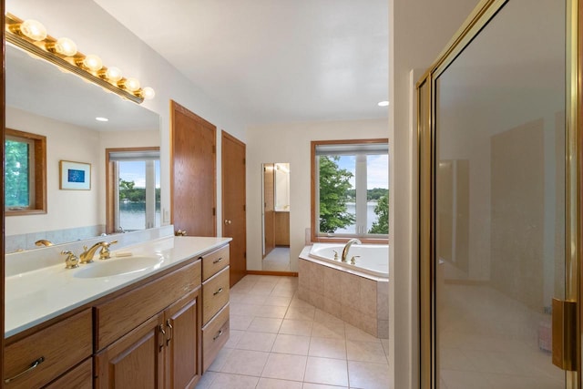 S7663 W Grandview Ave, Merrimac, WI 53561 - bathroom with vanity, a bath, a stall shower, tile patterned floors, and a water view
