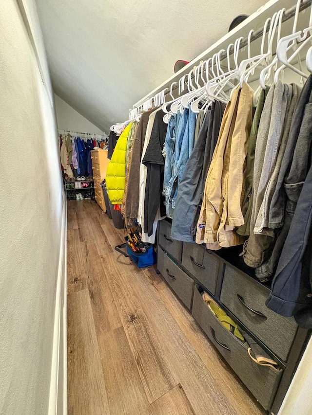 417 W 7th Ave, Oshkosh, WI 54902 - walk in closet with vaulted ceiling and wood finished floors