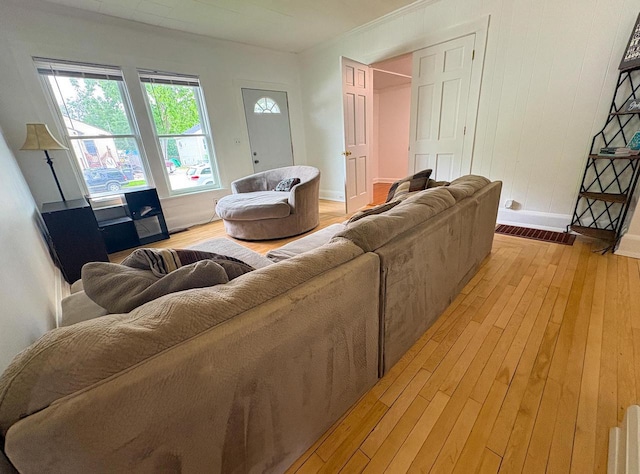 417 W 7th Ave, Oshkosh, WI 54902 - living room with light wood-type flooring and baseboards
