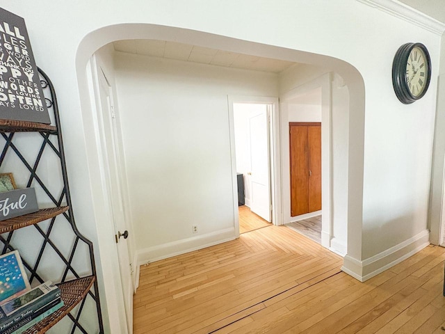 417 W 7th Ave, Oshkosh, WI 54902 - hall featuring arched walkways and light wood-style flooring