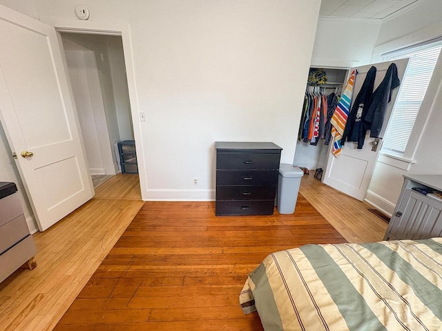 417 W 7th Ave, Oshkosh, WI 54902 - bedroom featuring hardwood / wood-style floors and a closet