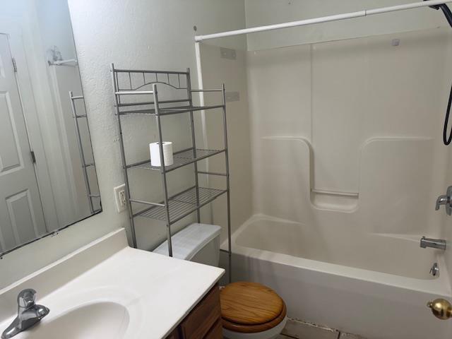 1225 Merrill St, Beloit, WI 53511 - full bathroom with vanity and shower / bathtub combination