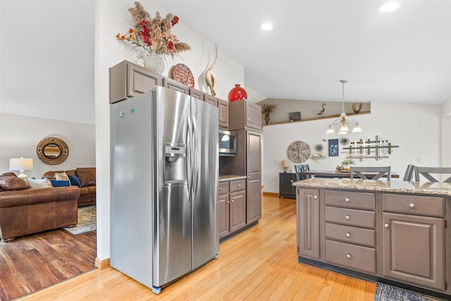 2570 Country Meadow Ct, Green Bay, WI 54313 - kitchen with stainless steel appliances, gray cabinetry, vaulted ceiling, light wood finished floors, and recessed lighting