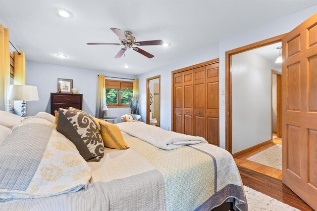 2570 Country Meadow Ct, Green Bay, WI 54313 - bedroom with hardwood / wood-style floors, recessed lighting, a closet, and a ceiling fan