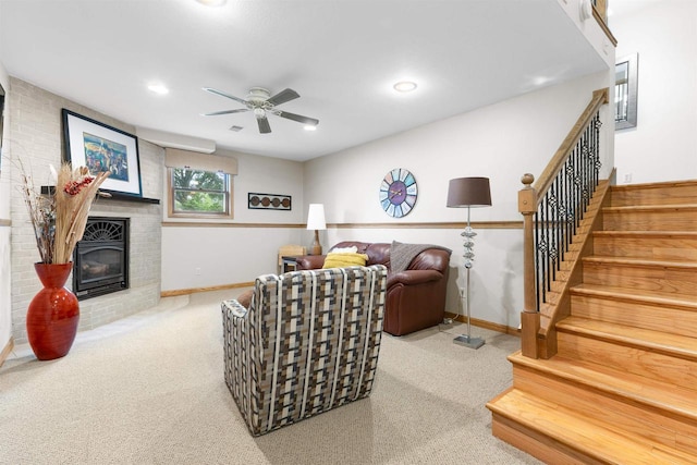 2570 Country Meadow Ct, Green Bay, WI 54313 - carpeted living room with stairs, ceiling fan, a brick fireplace, and recessed lighting