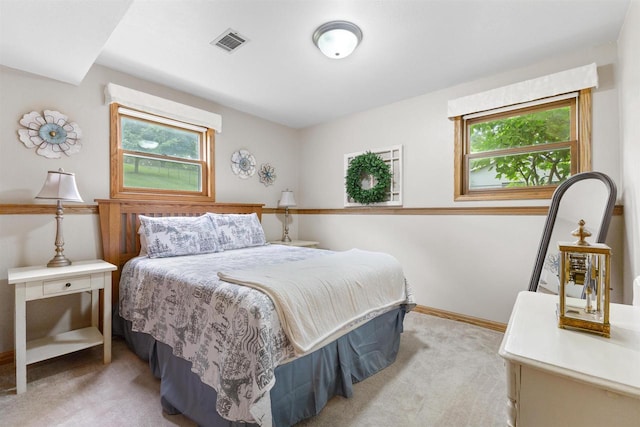 2570 Country Meadow Ct, Green Bay, WI 54313 - bedroom featuring light colored carpet and multiple windows