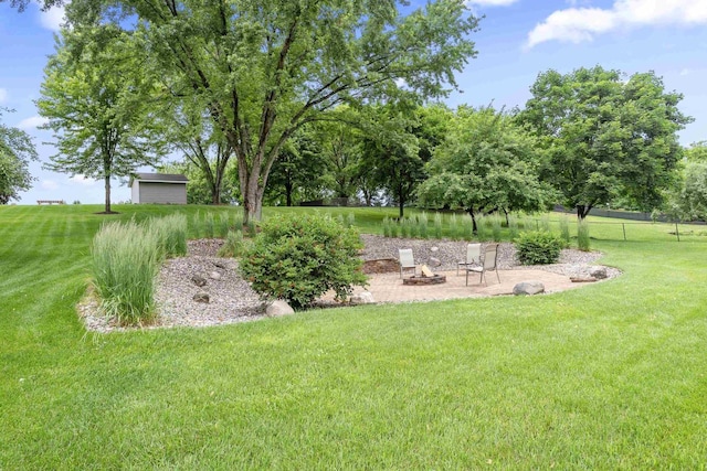 2570 Country Meadow Ct, Green Bay, WI 54313 - view of green lawn featuring an outdoor fire pit