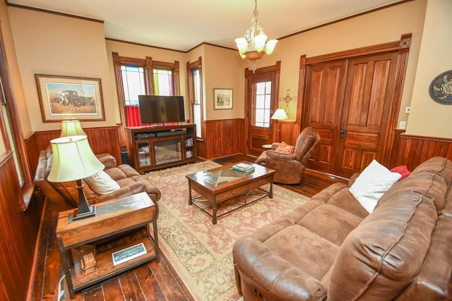 823 E Brandybrook Rd, Wales, WI 53183 - living room with wainscoting, wooden walls, healthy amount of natural light, hardwood / wood-style floors, and crown molding