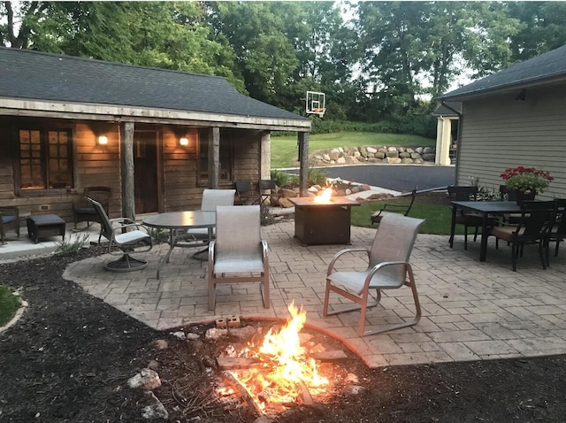 823 E Brandybrook Rd, Wales, WI 53183 - view of patio / terrace with a fire pit and outdoor dining space