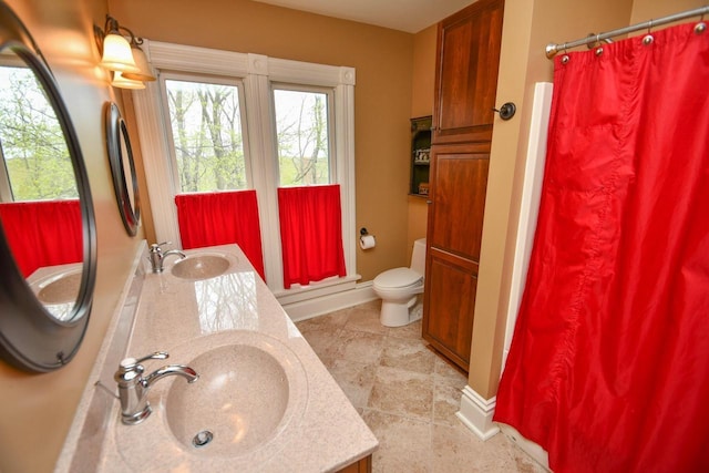 823 E Brandybrook Rd, Wales, WI 53183 - bathroom with double vanity, curtained shower, and tile patterned flooring