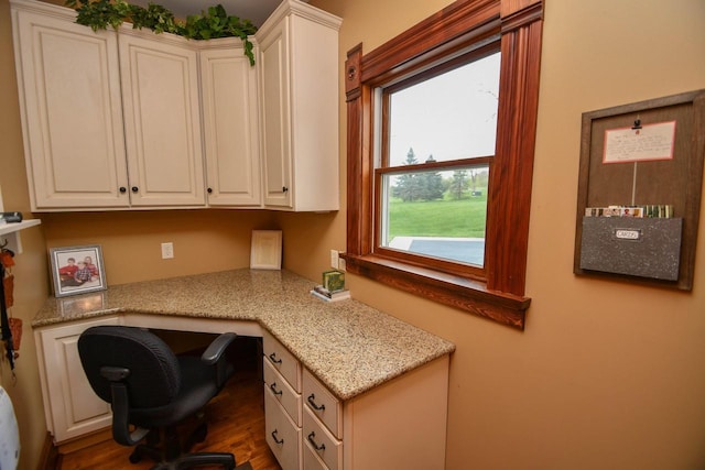 823 E Brandybrook Rd, Wales, WI 53183 - office space with built in desk and dark wood-style flooring