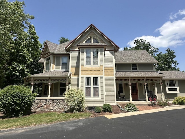 823 E Brandybrook Rd, Wales, WI 53183 - victorian home featuring a porch and a shingled roof