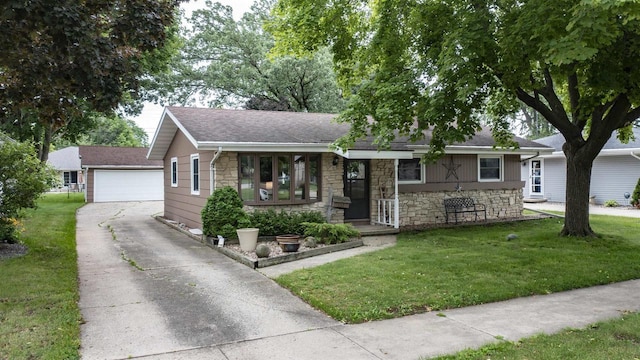 132 N Eagle St, Oshkosh, WI 54902 - ranch-style house featuring stone siding, a front lawn, a detached garage, and roof with shingles