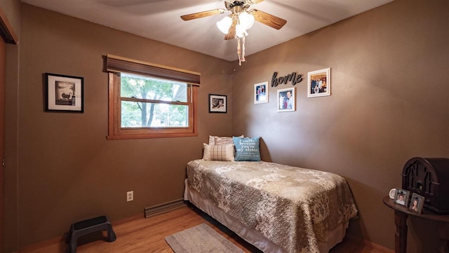 132 N Eagle St, Oshkosh, WI 54902 - bedroom with light wood-style floors and a ceiling fan