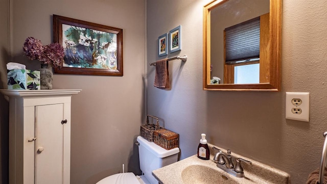 132 N Eagle St, Oshkosh, WI 54902 - half bathroom with toilet and vanity