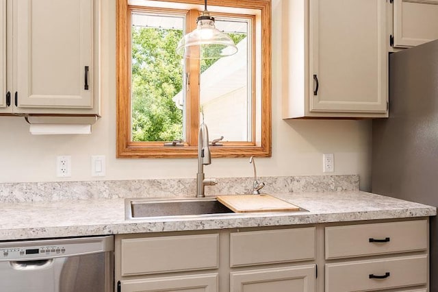 810 Capman St, Milton, WI 53563 - kitchen featuring appliances with stainless steel finishes, light countertops, and pendant lighting