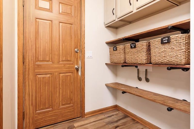 810 Capman St, Milton, WI 53563 - mudroom with light wood finished floors and baseboards