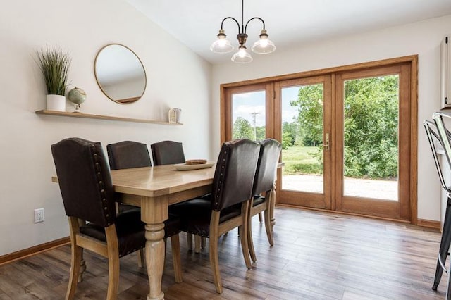 810 Capman St, Milton, WI 53563 - dining room featuring light wood-type flooring and a chandelier