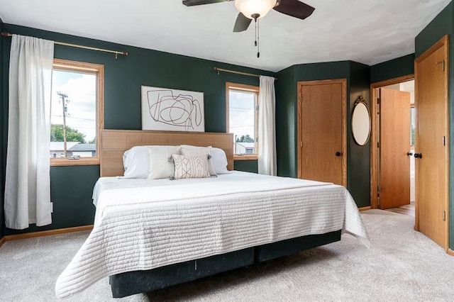 810 Capman St, Milton, WI 53563 - bedroom with carpet, a ceiling fan, and a closet