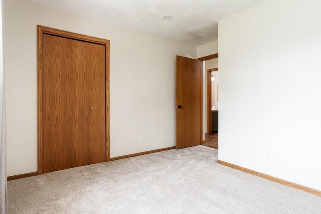 810 Capman St, Milton, WI 53563 - unfurnished bedroom with light colored carpet and a closet