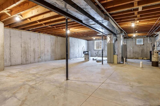 810 Capman St, Milton, WI 53563 - basement featuring heating unit and water heater