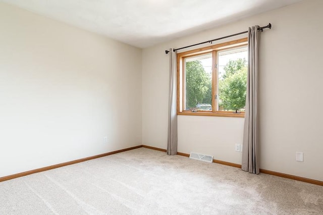 810 Capman St, Milton, WI 53563 - carpeted spare room featuring baseboards